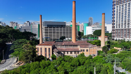 Fototapeta premium Matarazzo Factory At Sao Paulo In Brazil. Medieval Building. Downtown District. Highrise Chimneys. Matarazzo Factory At Sao Paulo In Brazil. Railway Transport. 