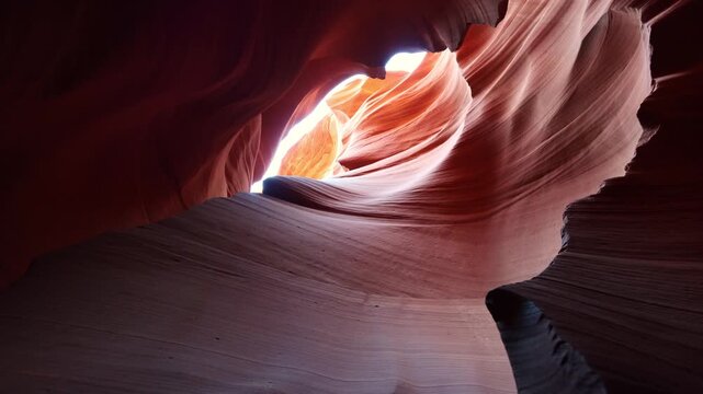 Flowing sandstone curves and vibrant layered patterns inside the narrow slot of Lower Antelope Canyon