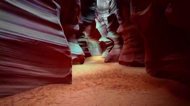 Flowing sandstone curves and vibrant layered patterns inside the narrow slot of Lower Antelope Canyon