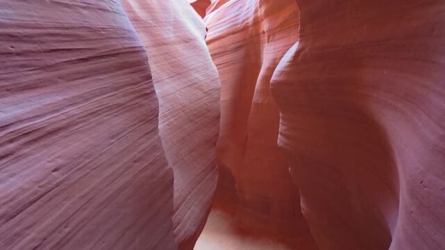 Flowing sandstone curves and vibrant layered patterns inside the narrow slot of Upper Antelope Canyon
