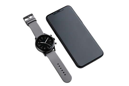 Gray smart watch with black face next to dark smartphone on black background band, Png, Isolated on Transparent Background, Cut Out