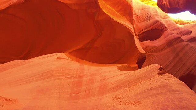 Flowing sandstone curves and vibrant layered patterns inside the narrow slot of Lower Antelope Canyon