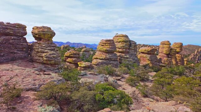 Scenic rock formations along Heart of Rocks Trail within rugged landscape of Chiricahua National Monument