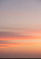 Soft pastel sunset gradient sky at twilight with blurred horizon line