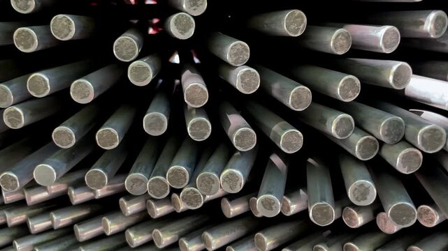 Steel Rods Stacked in Multiple Directions Industrial Close-Up