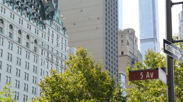 New York City Manhattan Midtown, United States. Old historic hotel building 1907 on Grand Army Plaza, 5 fifth avenue sign near Central Park. Classic iconic american architecture. Pulitzer Plaza in NYC