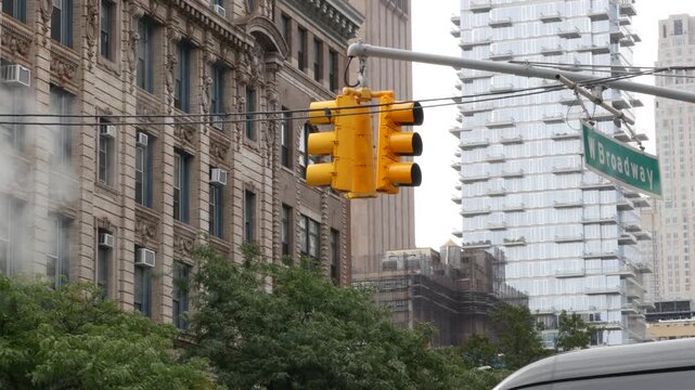 New York City West Broadway street sign in Lower Manhattan, United States. Urban road sign in american city, traffic sign in NYC. Building architecture, Tribeca district. Hot steam and traffic light.