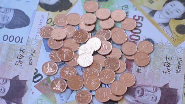 Korea, Korean cash bills, and the won currency for exchange and financial transactions. Korean won as a financial background for your design