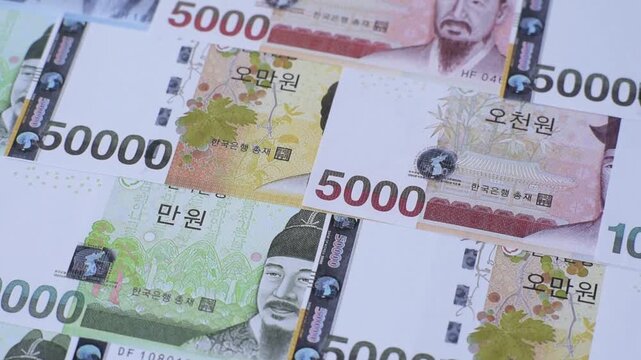 Korea, Korean cash bills, and the won currency for exchange and financial transactions. Korean won as a financial background for your design