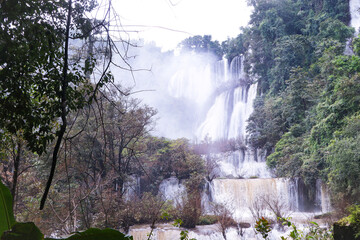 Thi Lo Su in Tak province waterfall largest said to be most beautiful in Thailand. It is 6th largest in Asia. Landscape nature of waterfall in rainy season with white mist spread throughout area. 