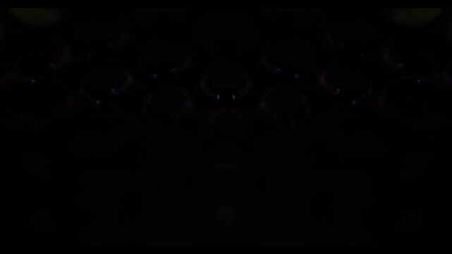 multicolored light through a perforated surface