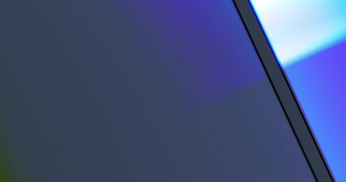 Soft gradient of refracted light transitioning through warm and cool colors with smooth optical blending.