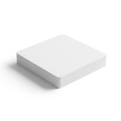Fototapeta premium Stack of neatly arranged white paper sheets placed on a plain background