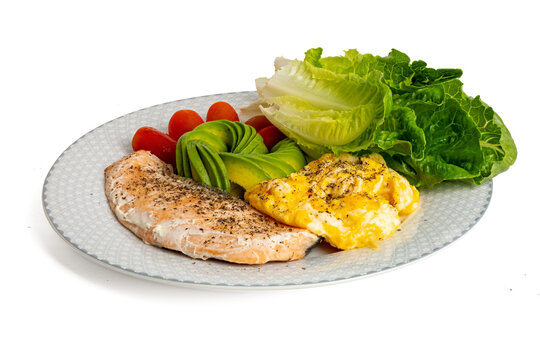 A High resolution 45MP photo of healty food salmon and omlet steak with vegetable on plate.