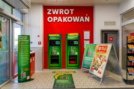 Packaging return point in Kaufland supermarket with reverse vending machines for bottle recycling, deposit system in Poland, sustainable retail environment, eco-friendly waste management and plastic c