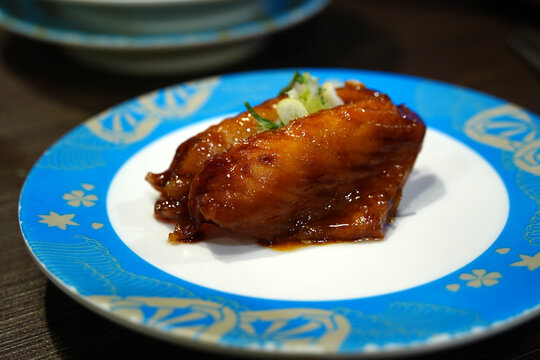 Close-up of tasty eel nigiri sushi in a traditional Japanese sushi restaurant