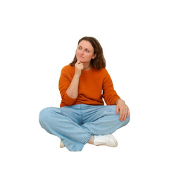 Woman sitting on floor and thinking. Pensive woman looking away with hand on chin. Portrait of...