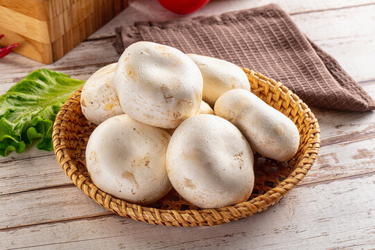 Raw white champignon mush heap