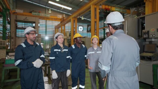 Team of engineers discussing work plan in the industry