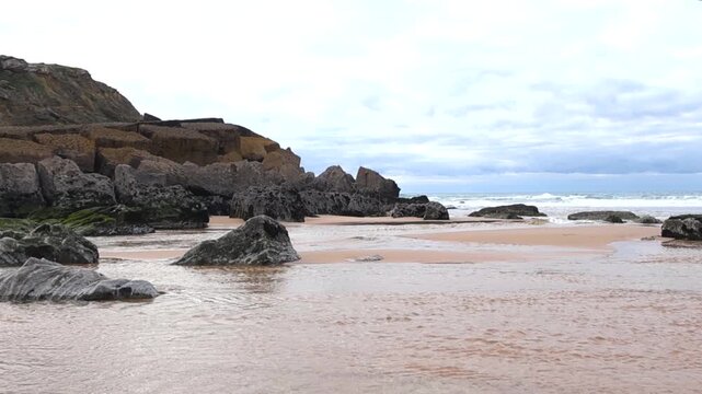 Colares River Flowing into the Ocean at Praia das Macas Beach