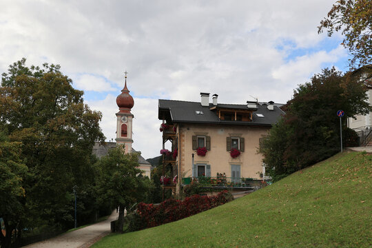 View of the tower of the parish church of St. Ulrich in South Tyrol, Italy