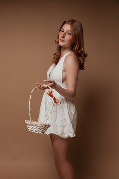 Girl in White Dress with Basket, Easter Theme