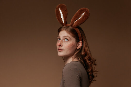Easter Bunny Girl in Brown Dress, Profile