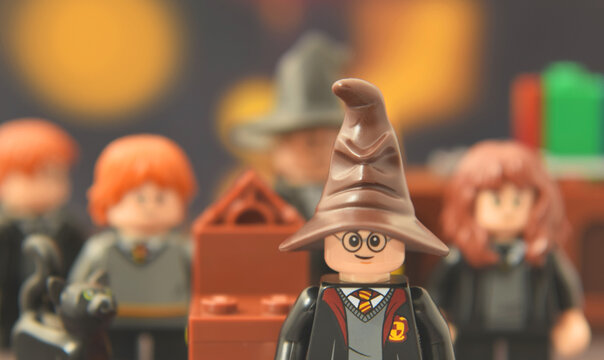 L&ouml;rrach, Germany - April 4th 2026: Lego minifigure of Harry Potter in speaking hat against the blurred crowd. Editorial illustrative image of famous fantasy person.