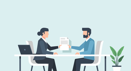 Obraz premium Two professionals discussing documents at a desk.