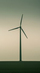 Fototapeta premium Single Wind Turbine Standing in a Vast Green Field Under a Muted Sage Sky for Sustainability Report Cover with Ample Copy Space Background