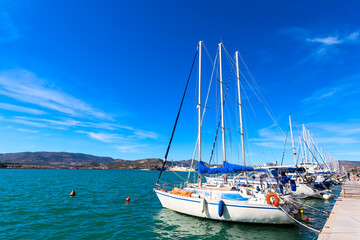 Obraz premium Sailing ships and yachts moored in the port of Volos, Greece