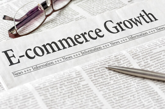 A newspaper with the headline E-commerce Growth