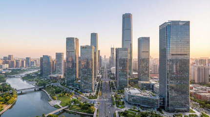 Obraz premium Aerial View of a Modern City with River and Skyscrapers at Dawn