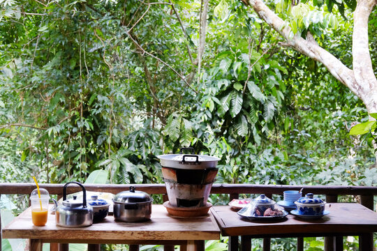 Moo Krata, Thai food, Barbecue set on wooden table on terrace in Thailand 