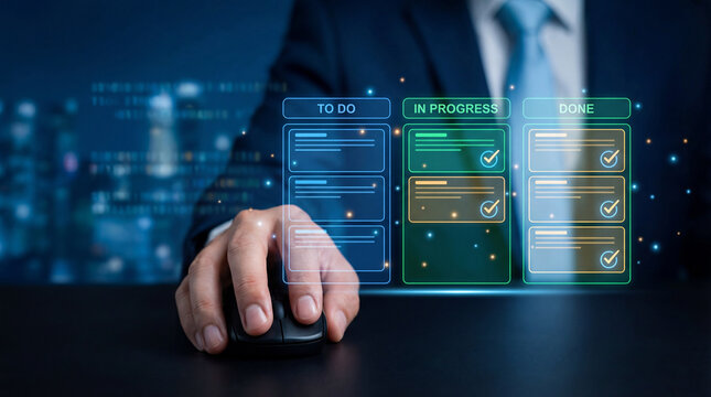 Businessman using computer mouse with digital kanban board overlay. Project management and agile workflow concept. Task organization and productivity tracking