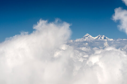 Himalayas Nepal, peak of Mt Everest above clouds