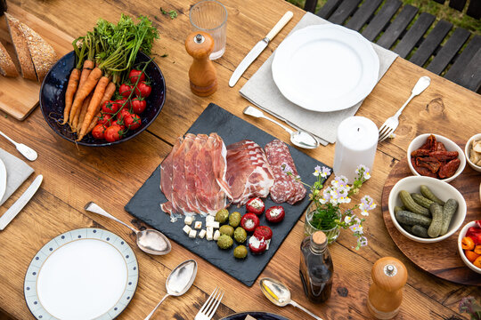 Rustic outdoor charcuterie dining setup
