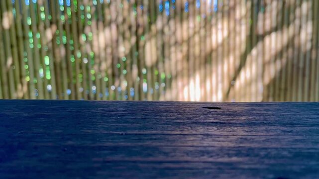 Wood table with bamboo background
