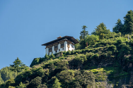 Paro Bhutan, traditional building on mountain ridge