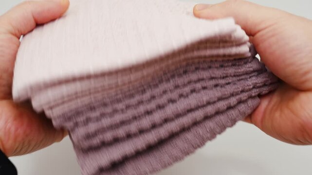 How to fold kitchen towels in neat stacks for better organization and easy access
