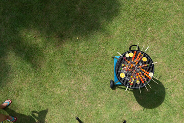 Outdoor barbecue with grilled skewers