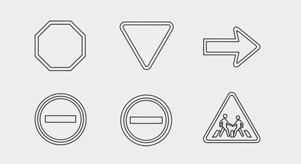 Set of road signs including stop, yield, direction, no entry, and pedestrian crossing warnings © shitul