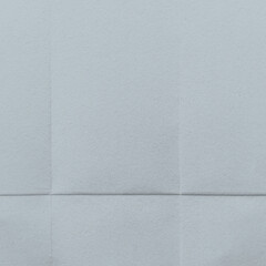 Fototapeta premium Textured blue paper background with copy space