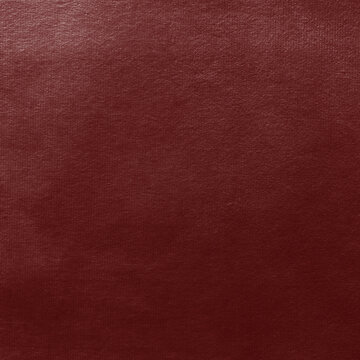 Rich textured maroon leather background