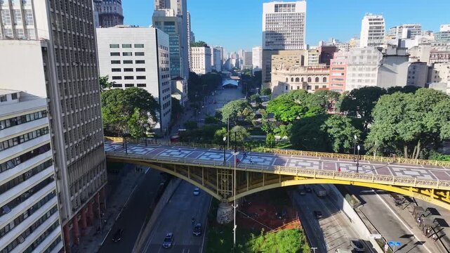 Santa Efigenia Bridge In Sao Paulo Brazil. Cars Driving Towards Downtown City On The Famous Bridge. Business Sky Background Downtown Cityscape. Business Backgrounds Panorama. Sao Paulo Brazil.
