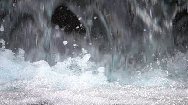 Waterfall Plunges Into River Loop Background