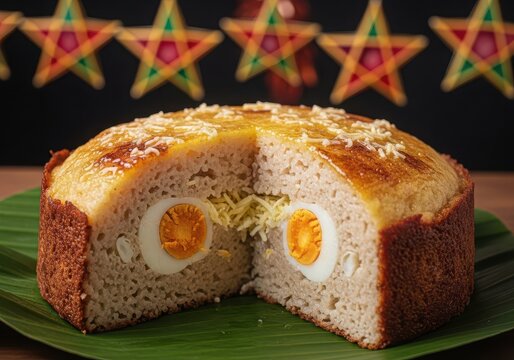 Traditional filipino bibingka rice cake with salted egg and cheese topping served on a banana leaf