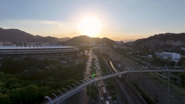 Maracana Stadium In Rio De Janeiro Brazil. Modern Football Stadium Overlooking A Dense Downtown City. Sunset Sky Downtown Cityscape. Sunset Outdoors Famous. Rio de Janeiro Brazil.