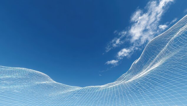Abstract 3d wireframe mesh curving on the horizon against a clear blue sky with