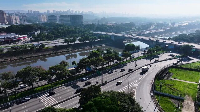 Marginal Tiete Road In Sao Paulo Brazil. Aerial View Of A High-Rise Buildings And Traffic Showcasing Urban Life. Business Clouds Sky Downtown Cityscape. Outdoor Downtown Panning Wide.
